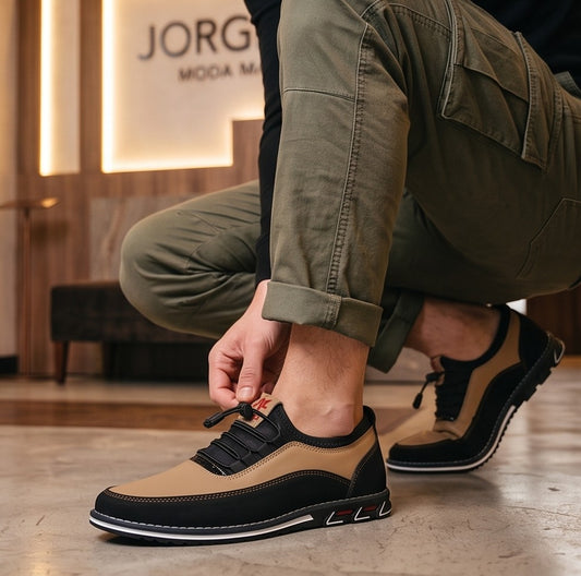 Colección de zapatos casuales para hombre en tres variantes de color: camel con negro, gris con negro y negro total monocromático, todos con sistema de cordones elásticos ajustables, costuras reforzadas y suela deportiva con detalles geométricos