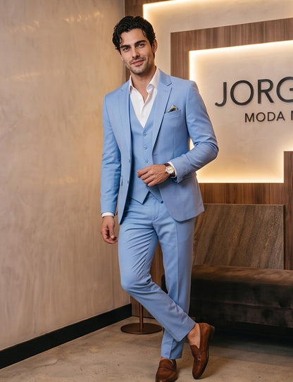 traje de tres piezas de sastre, que incluye un blazer, un chaleco y pantalones, disponible en una variedad de colores: azul marino, marrón tabaco, rojo burdeos, negro clásico y gris marengo