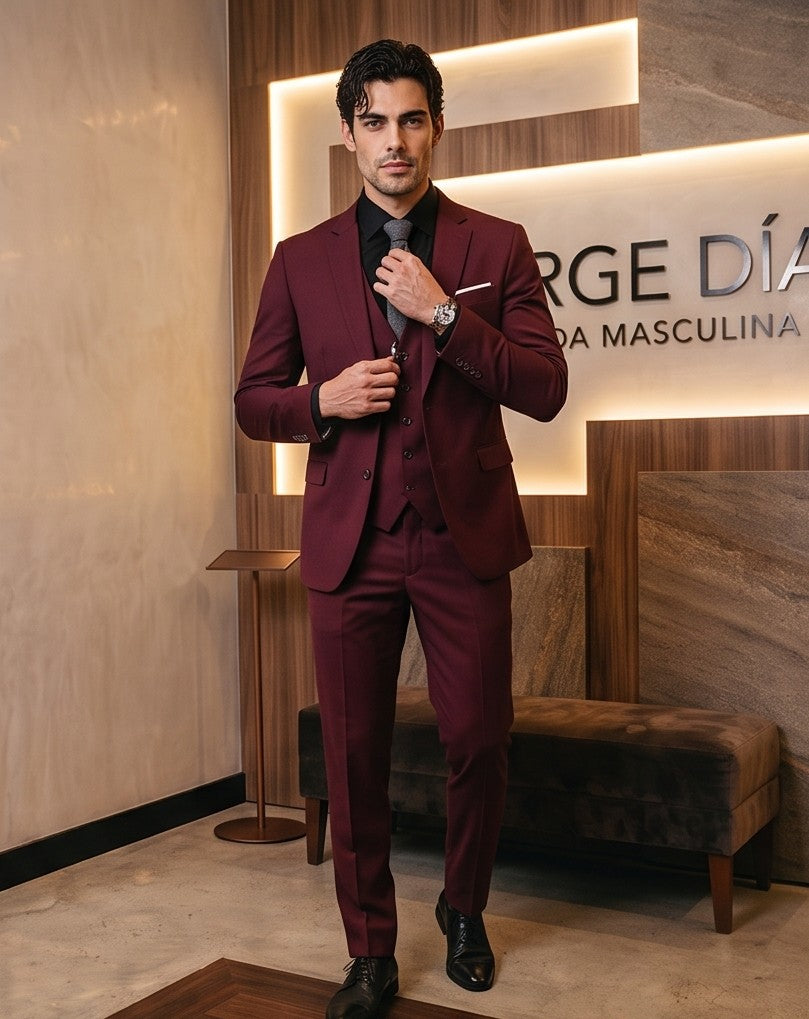 traje de tres piezas de sastre, que incluye un blazer, un chaleco y pantalones, disponible en una variedad de colores: azul marino, marrón tabaco, rojo burdeos, negro clásico y gris marengo
